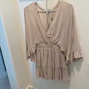 Beige ruffled romper